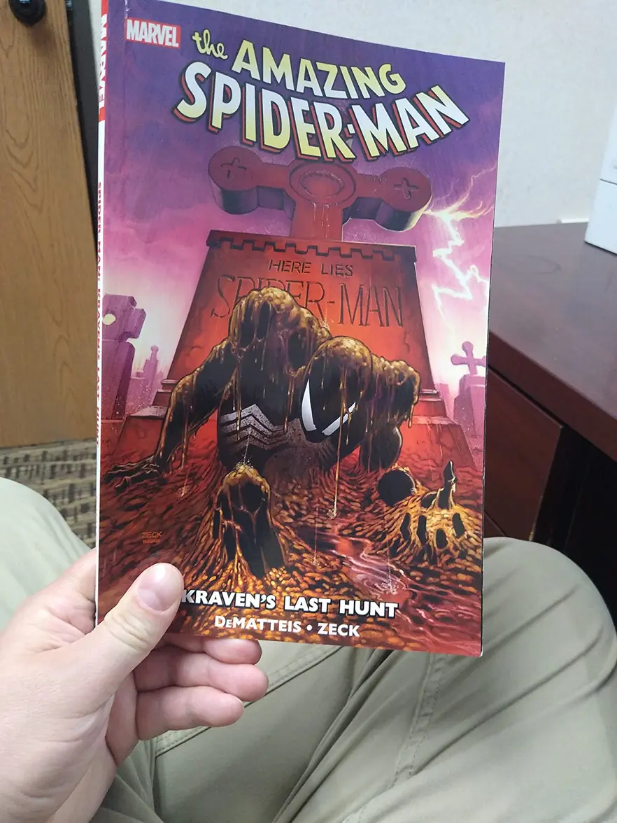 Open pages of Spider-Man Kraven's Last Hunt Paperback showing interior artwork