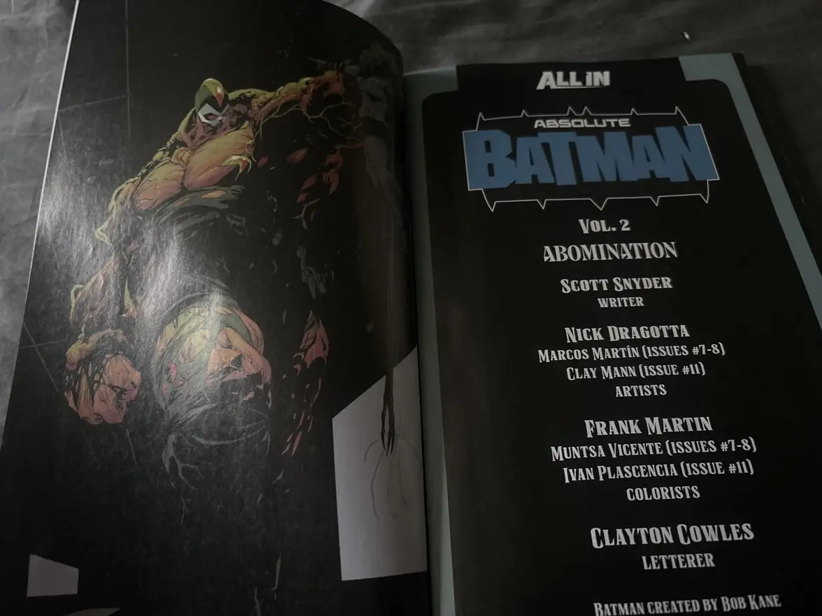 Absolute Batman Vol 2 Abomination comic book spine on a shelf